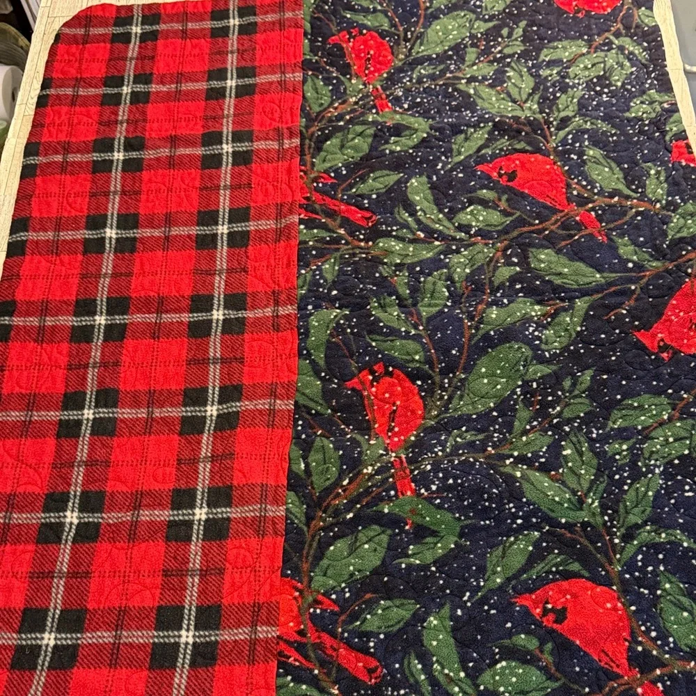 Holiday Santa quilt. Measures 34 x 45 inches . Perfect for hanging or lap quilt.